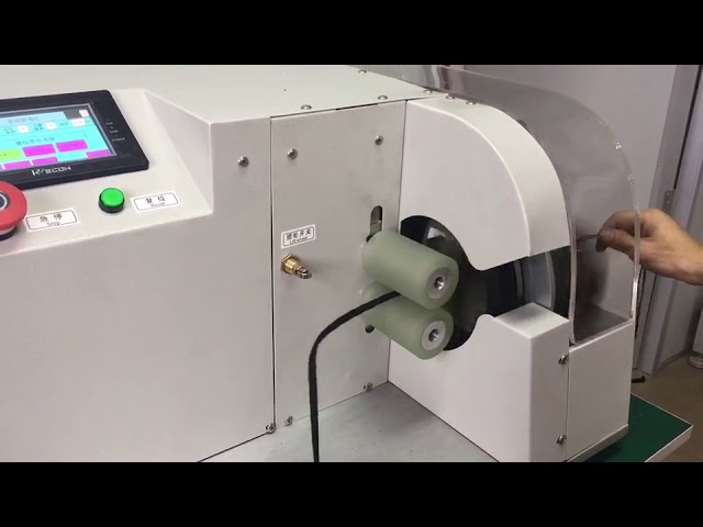 Tapeindpakningsmaskine